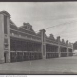 Image: An image of the State Herbarium's previous usage showing a series of 24 trams lined up inside the 'tram barn'.