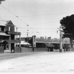 Image: An image of the State Herbarium in the early 1900s. Tram lines are shown running to the building and to the right is the Goodman administration building