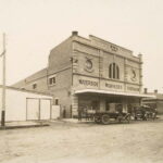 Two story building with awning and words "Waterside Workers Federation" written on facade