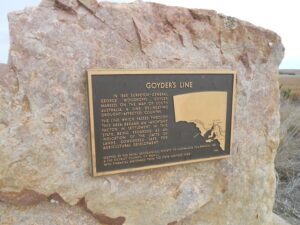 Image: bronze plaque on large stone