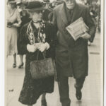 Image: Front view of a man and his wife walking in a street in melbourne